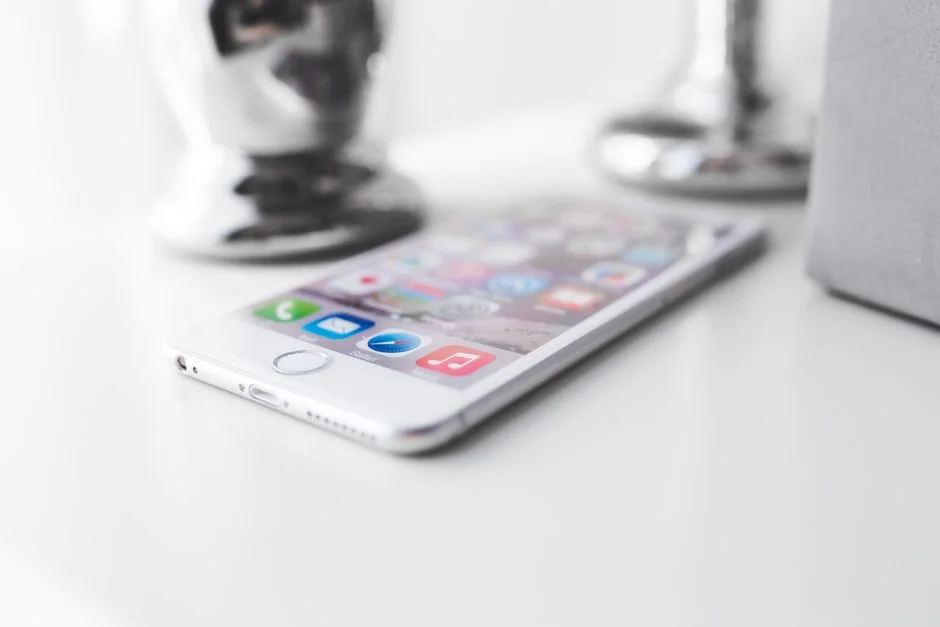 A sleek smartphone displaying artwork in a minimalist setting, perfect for tech and design themes.